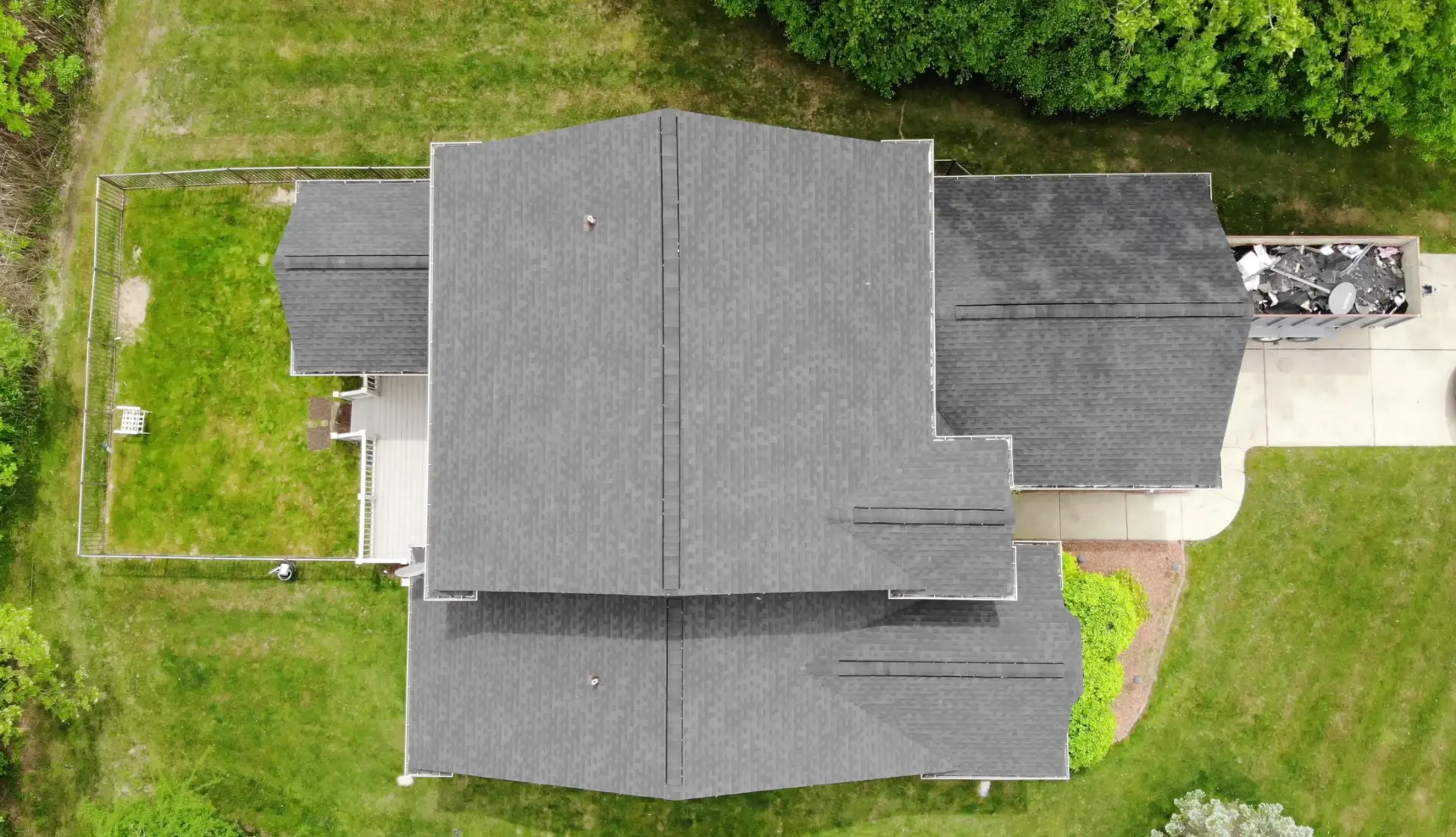 Drone view of a freshly completed architectural shingle roof by P D Roofing